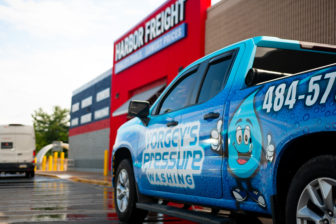 The Yorgey's Pressure Washing Truck on site at a commercial concrete cleaning job at Harbor Freight