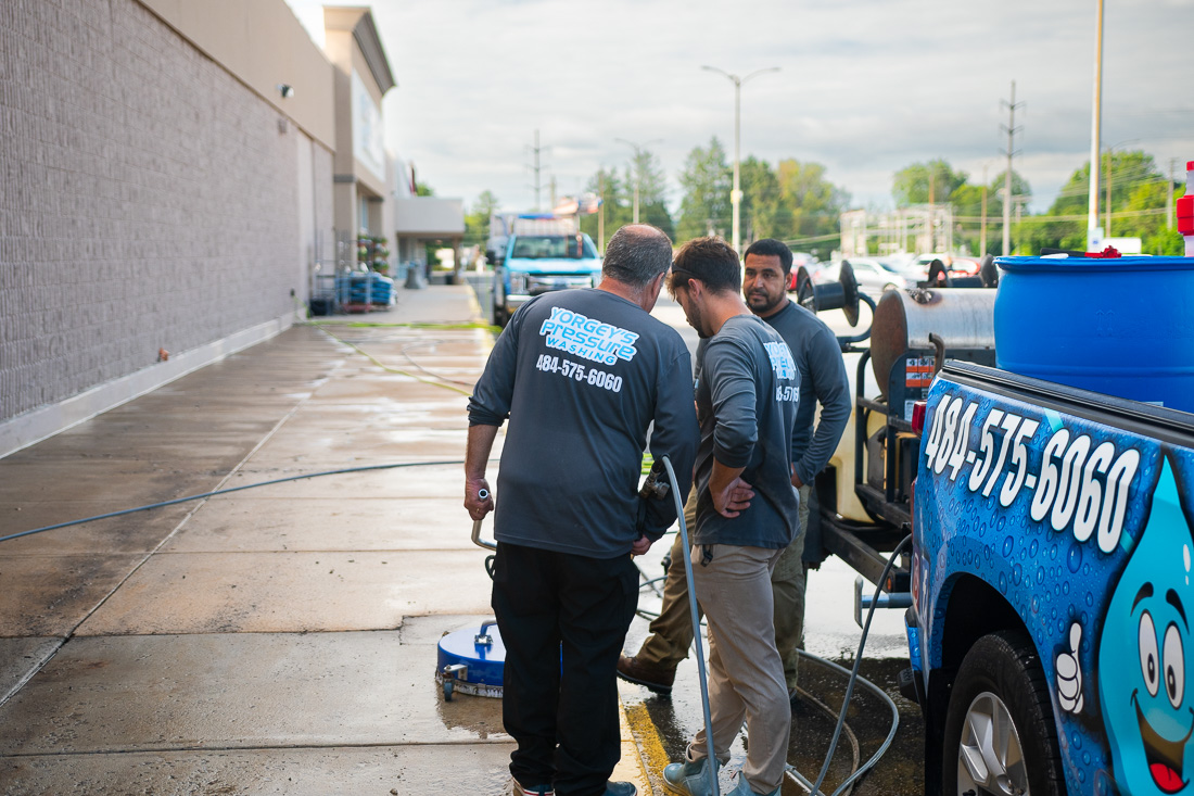 Yorgey's Pressure Washing Team handling a large scale commercial job